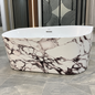 Baignoire autoportante SP1838-17-WC 170×79×58 cm, intérieur blanc et extérieur motif Calacatta, avec bonde et trop-plein, sans robinetterie.